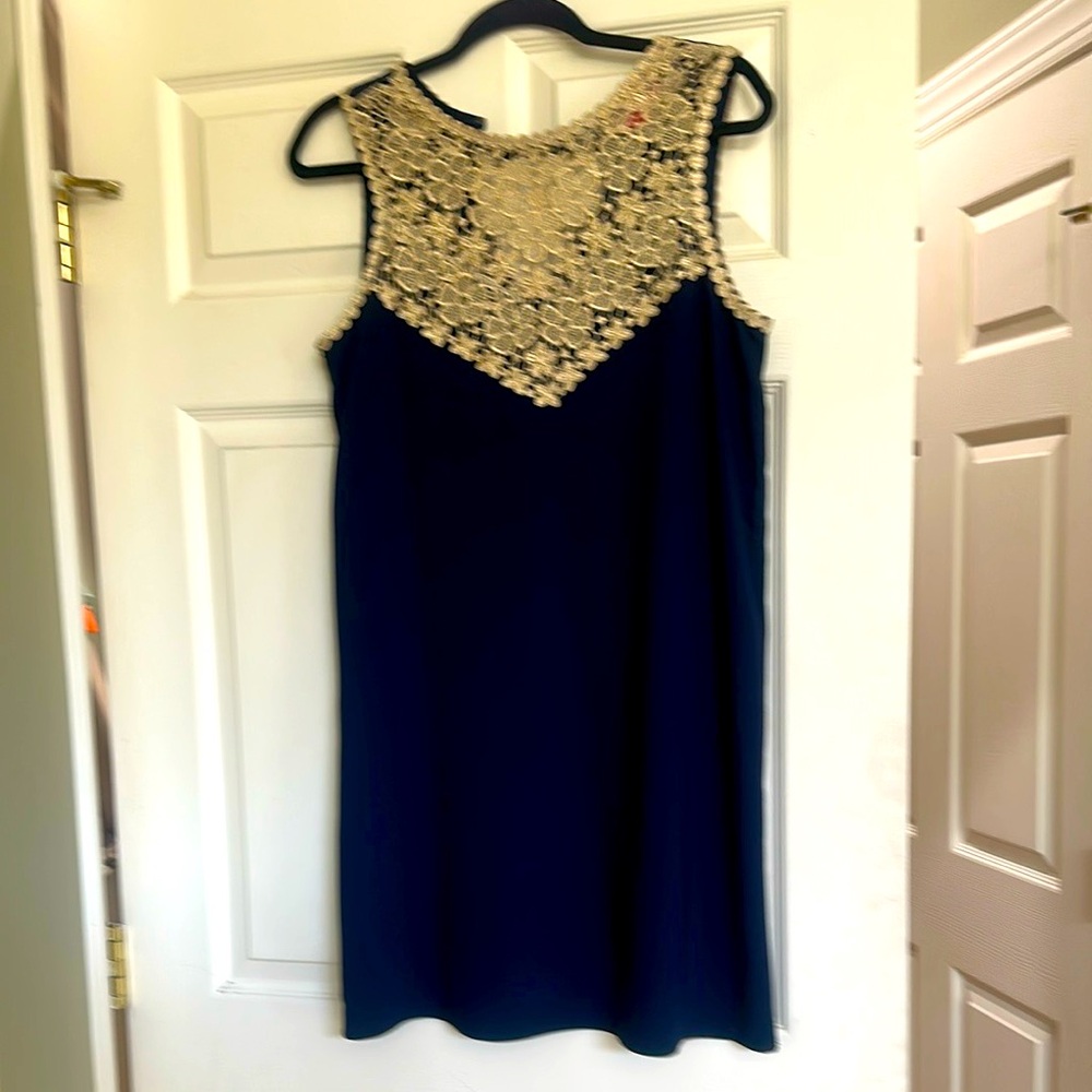 Beautiful navy dress with gold but on top like new